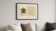 
Charger l'image dans la galerie, Matching black frame with white mount shown holding a Last Name Origin print (Byrne sample) above a sofa